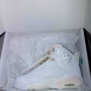 ON HOLD FOR BUYER.  Jordan Retro 6 Pink and White. women Size 6.5